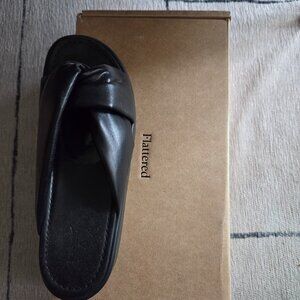 Black platform flip-flops